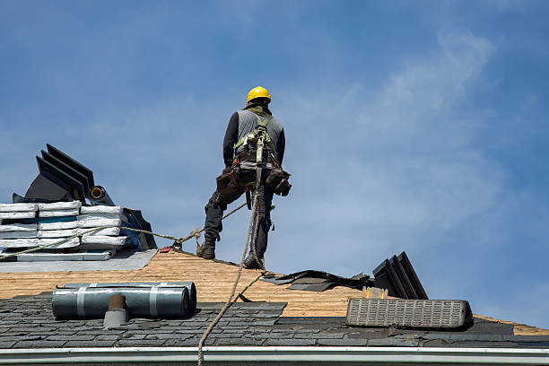 Professional Roofing technician working in Leoma, TN